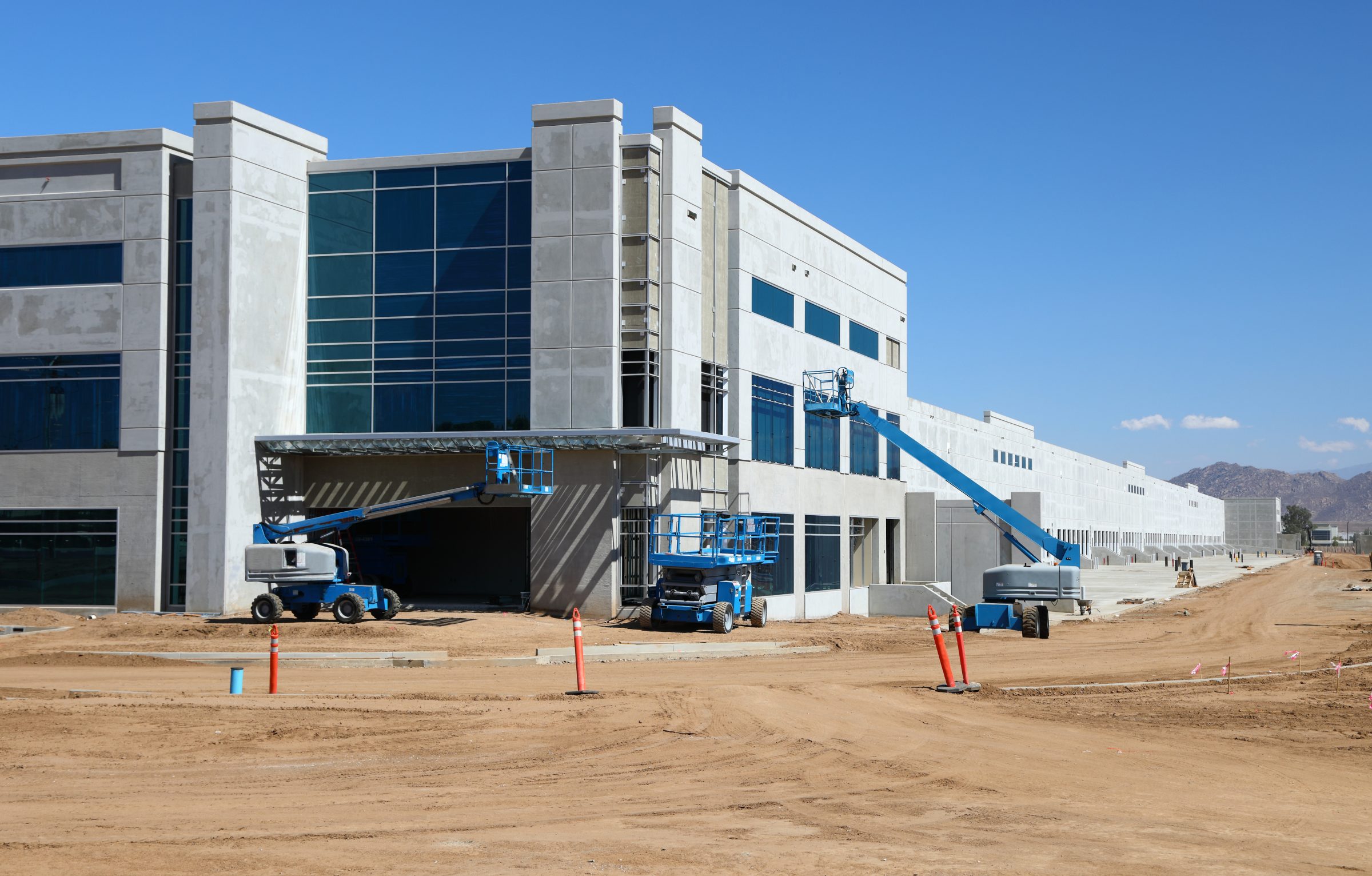Construction site with building and equipment