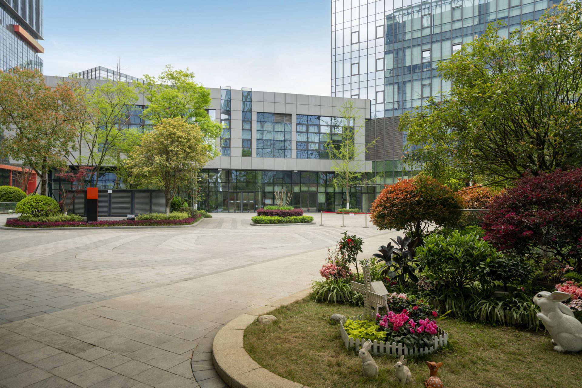 Modern building with landscaped garden area.