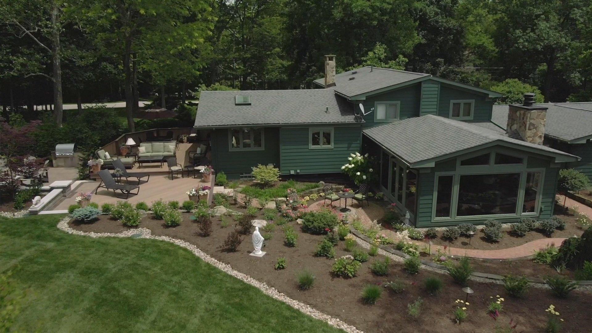 Modern house with garden and patio area.